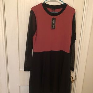 Mauve sweater center. Sheer black  details